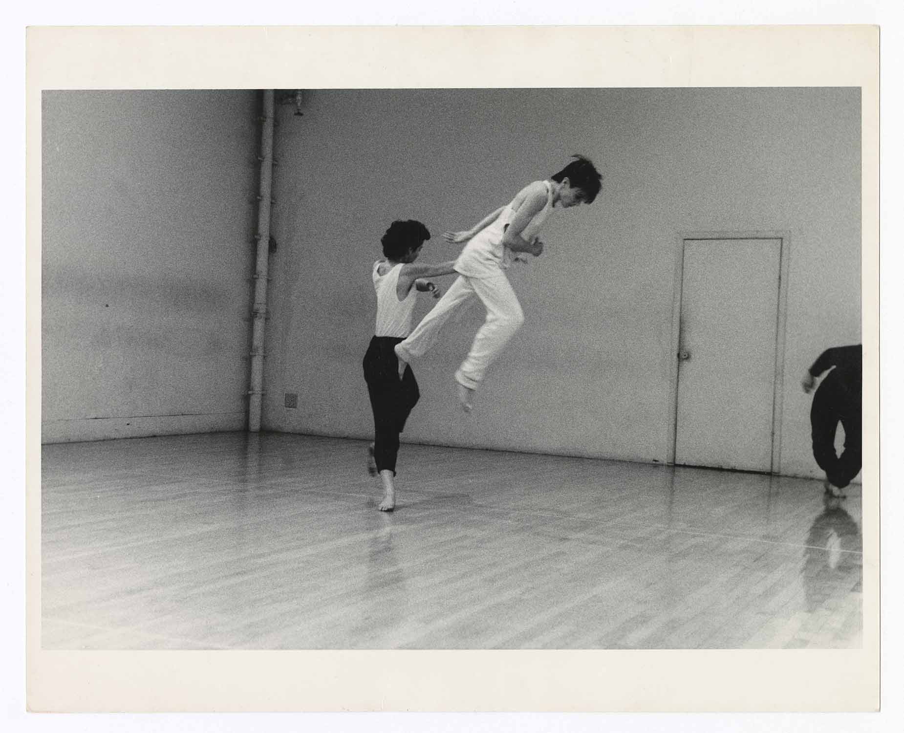 Vicky Shick and Diane Madden rehearsing Lateral Pass (1985) at Trisha Brown's loft in Lower Manhattan. Photograph © Paul Trachtman.