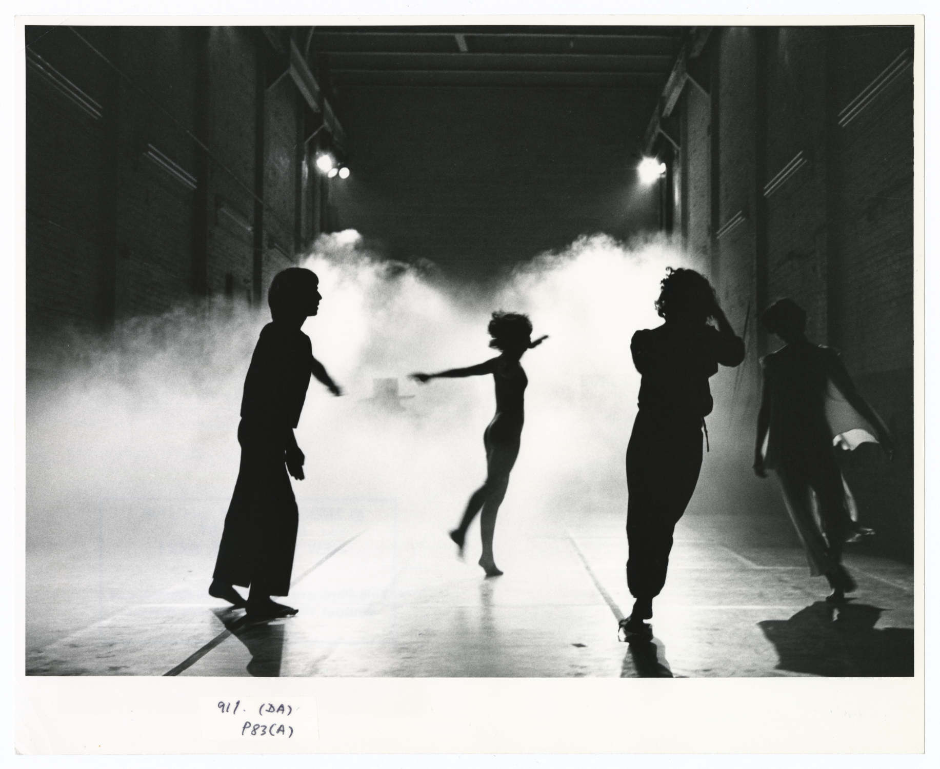 Stephen Petronio, Lisa Kraus, Trisha Brown and Eva Karczag in the premiere performance of Opal Loop / Cloud Installation #72503 (198 0). Presented at 55 Crosby Street, New York, June 10 – 14, 1980. Photograph © J. Paul Getty Trust.